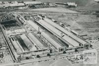 Aerial view of the Ford Company and wharf facilities on Corio Bay, 1955