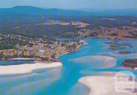 Aerial view of Mallacoota Camp Park and township from Bar