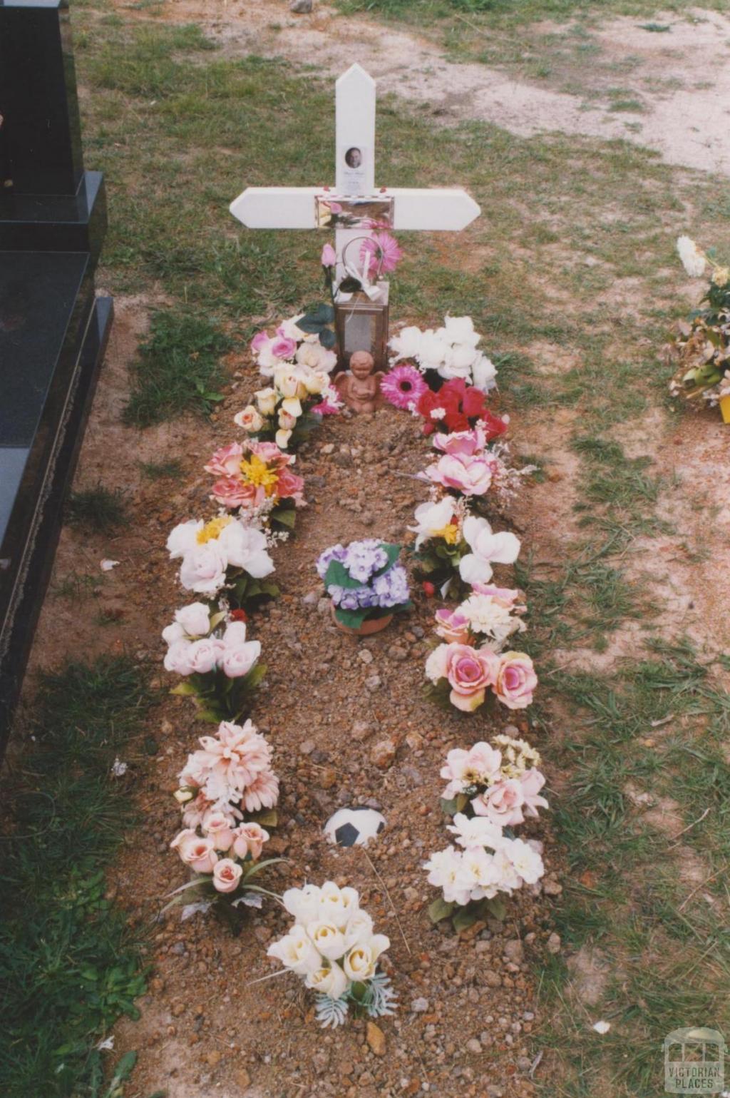 Plot with soccer ball, Yallourn cemetery, 2010
